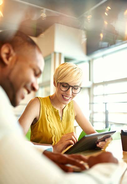 Woman holding a tablet Avelo Careers